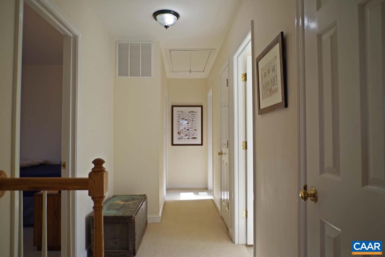 2657 Cardinal Ridge Road Charlottesville, VA 22901 - Photo 36 of 50 a view of a hallway with a bathroom