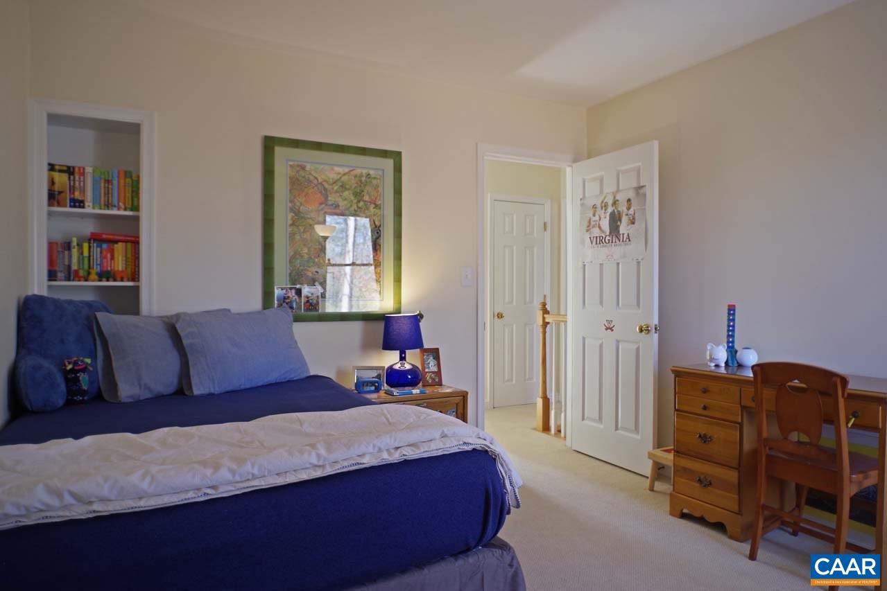 2657 Cardinal Ridge Road Charlottesville, VA 22901 - Photo 37 of 50 a bedroom with a bed and with furniture