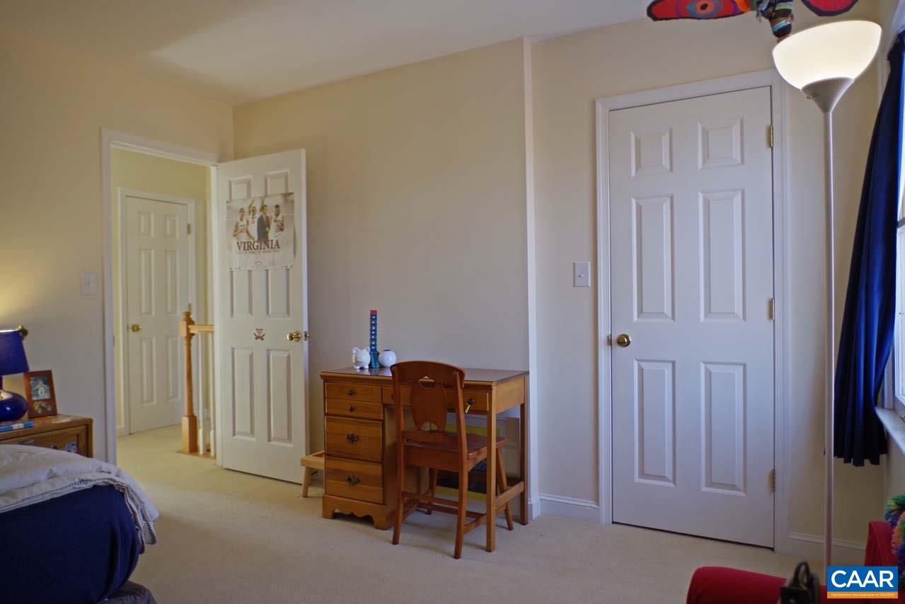 2657 Cardinal Ridge Road Charlottesville, VA 22901 - Photo 38 of 50 a bedroom with a bed and a closet