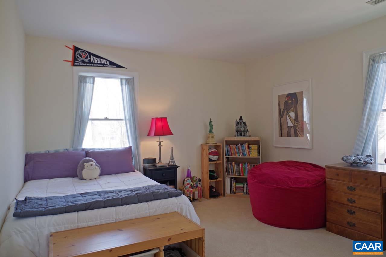 2657 Cardinal Ridge Road Charlottesville, VA 22901 - Photo 40 of 50 a bedroom with a bed and window