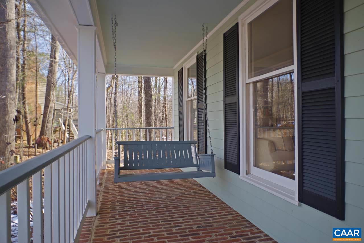 2657 Cardinal Ridge Road Charlottesville, VA 22901 - Photo 4 of 50 a view of a porch with wooden floor