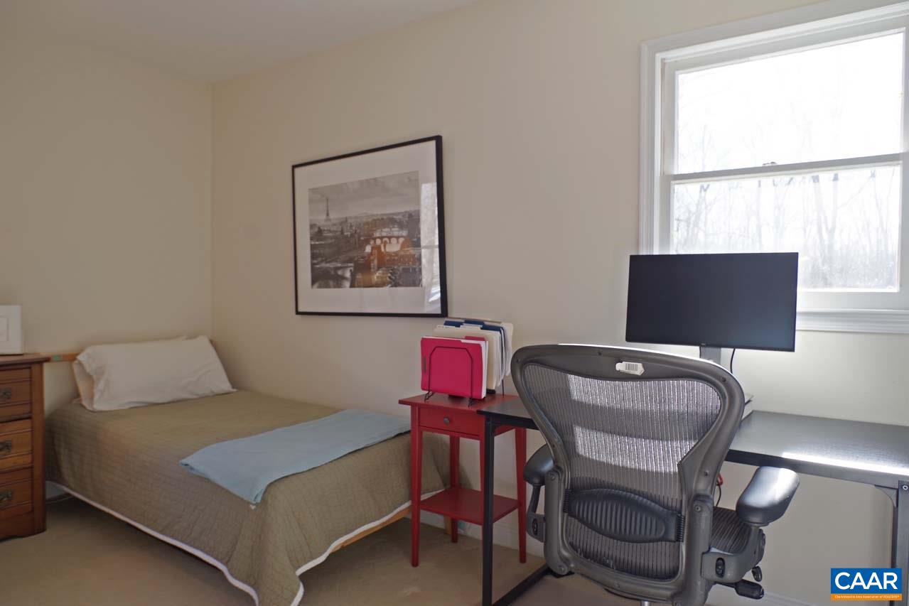 2657 Cardinal Ridge Road Charlottesville, VA 22901 - Photo 42 of 50 a bedroom with a bed and a window