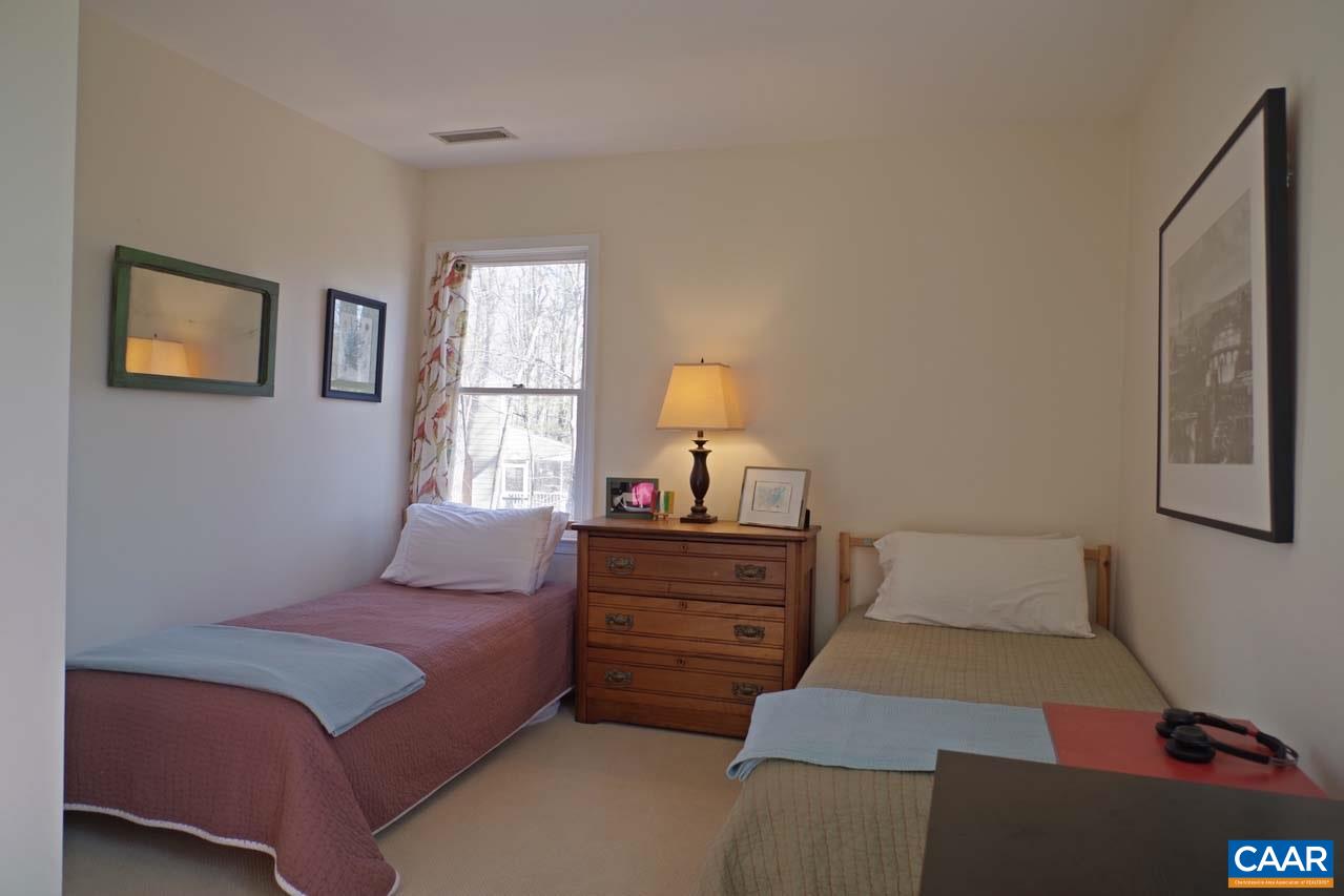 2657 Cardinal Ridge Road Charlottesville, VA 22901 - Photo 43 of 50 a bedroom with a bed and a window