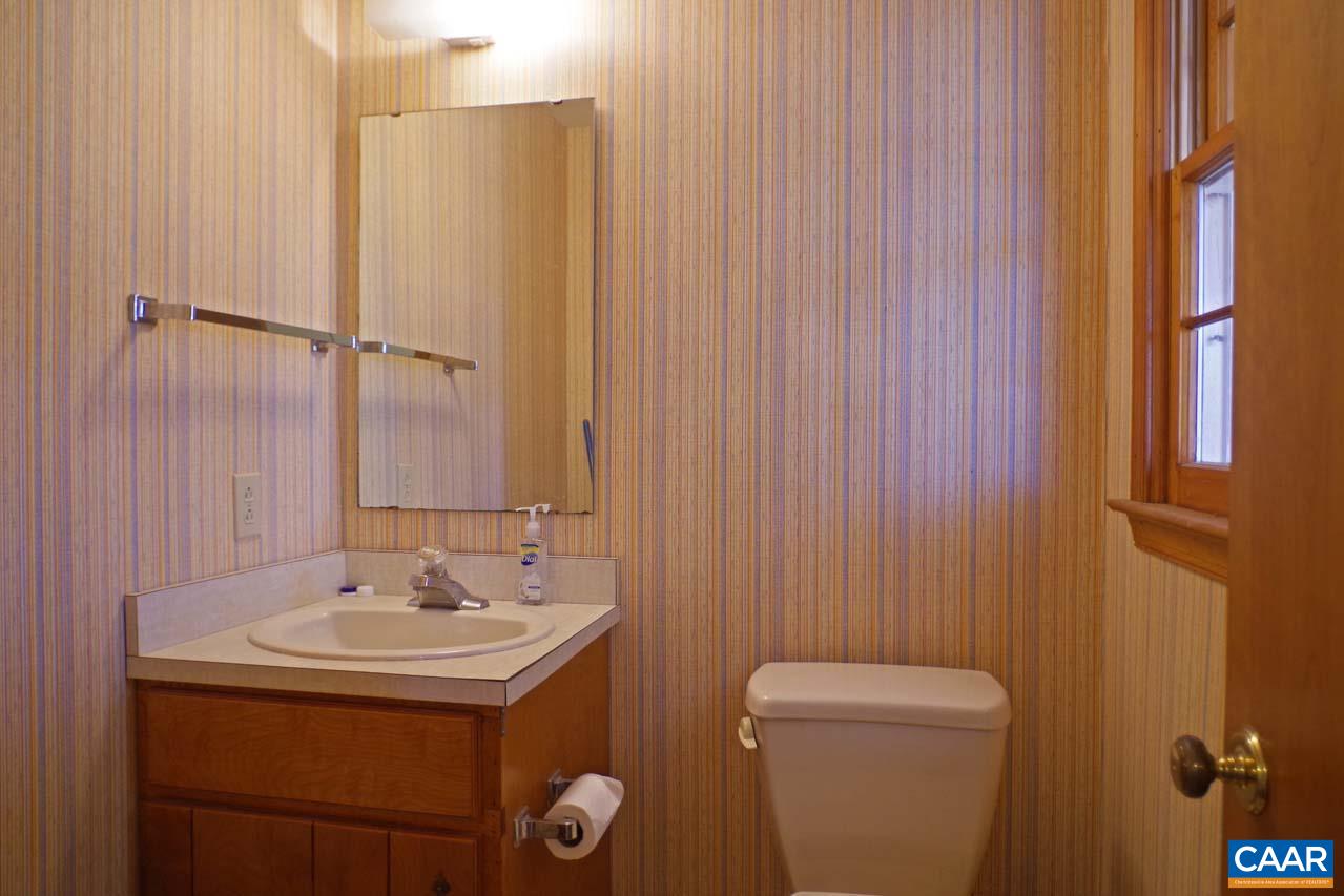 2657 Cardinal Ridge Road Charlottesville, VA 22901 - Photo 47 of 50 a bathroom with a sink a toilet and shower