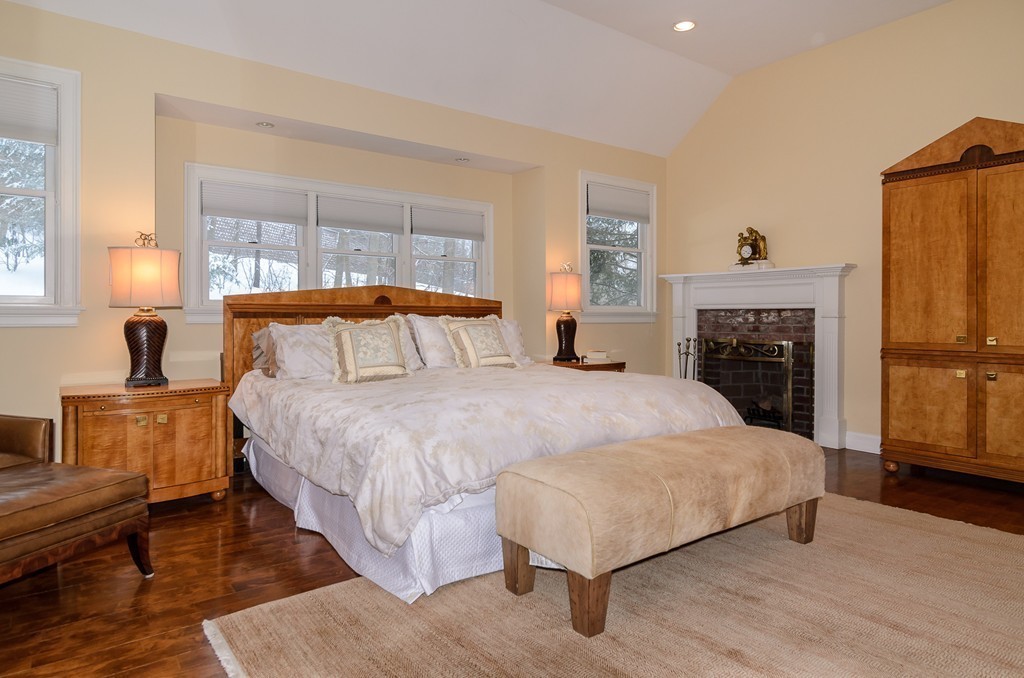 5 Wareland Road Wellesley, MA 02481 - Photo 11 of 19 a bedroom with a bed and wooden floor