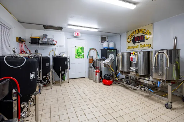 a view of a chairs and table in a patio
