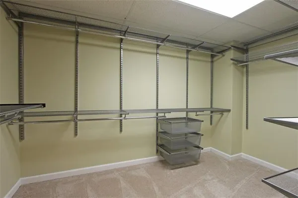 a view of a room with racks on the wall