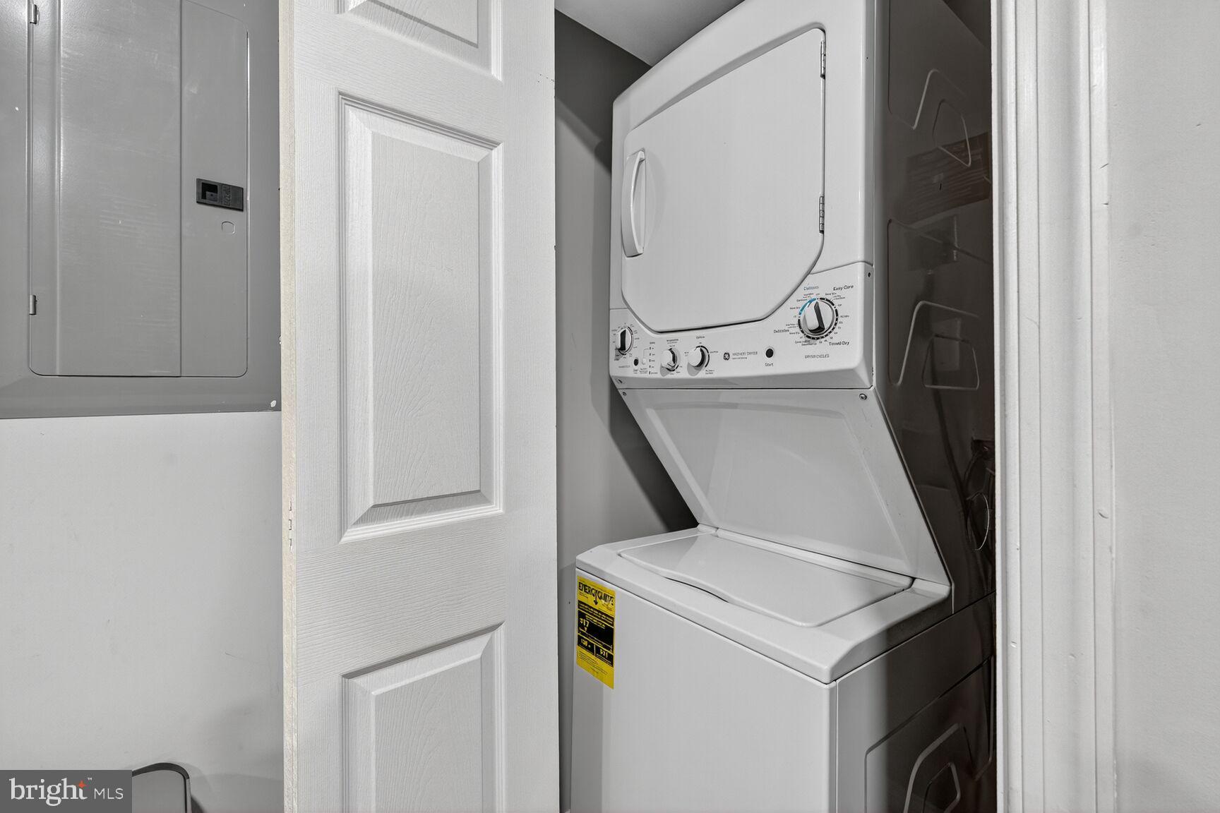 133 7th Street Southeast, Unit 3 Washington, DC 20003 - Photo 18 of 19 a utility room with dryer and washer