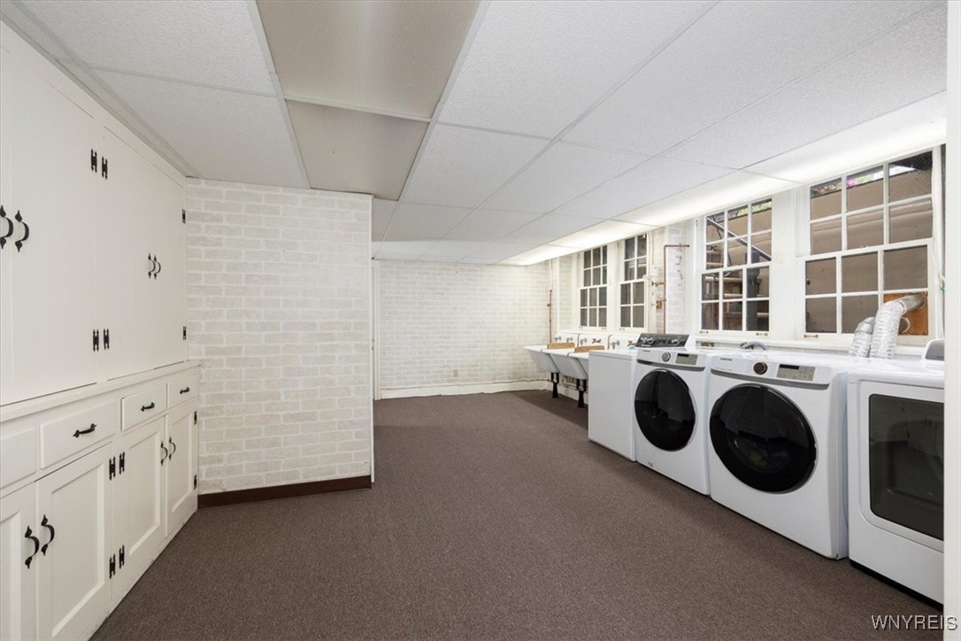 1005 Big Tree Road East Aurora, NY 14052 - Photo 31 of 50 BRIGHT LAUNDRY ROOM WITH BUILT IN STORAGE