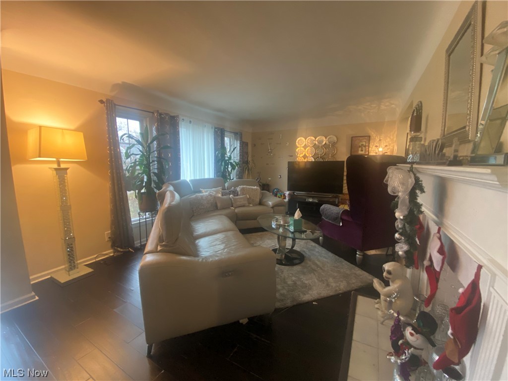 1500 Edgefield Road Lyndhurst, OH 44124 - Photo 2 of 24 Living room featuring hardwood / wood-style floors and radiator heating unit