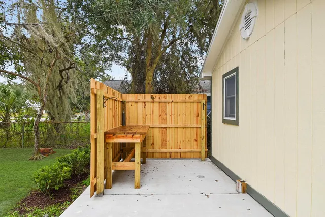 front view of a house with a trees