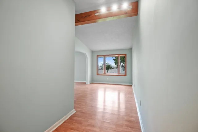 an empty room with windows