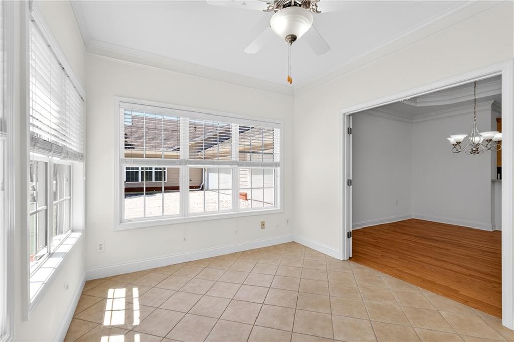226 Hames Road, Unit 140 Woodstock, GA 30188 - Photo 11 of 32 a view of an empty room with a window