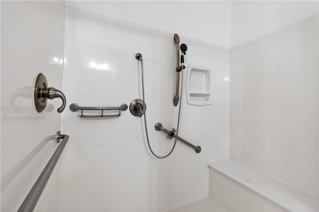 226 Hames Road, Unit 140 Woodstock, GA 30188 - Photo 19 of 32 a bathroom with a shower