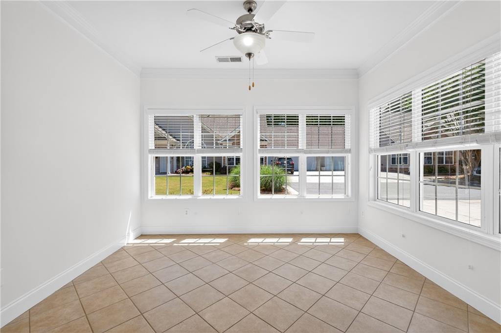 226 Hames Road, Unit 140 Woodstock, GA 30188 - Photo 10 of 32 a view of empty room with windows