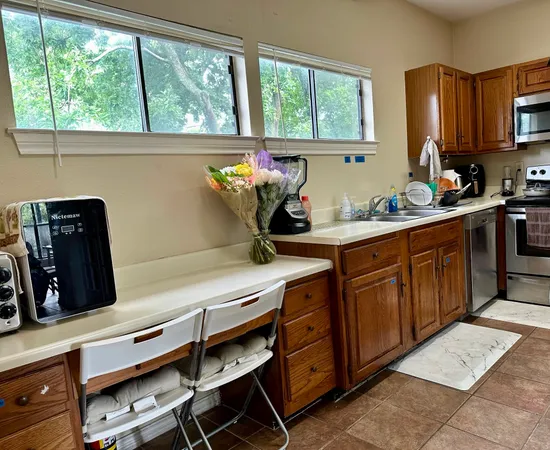 a view of hallway with washer and dryer