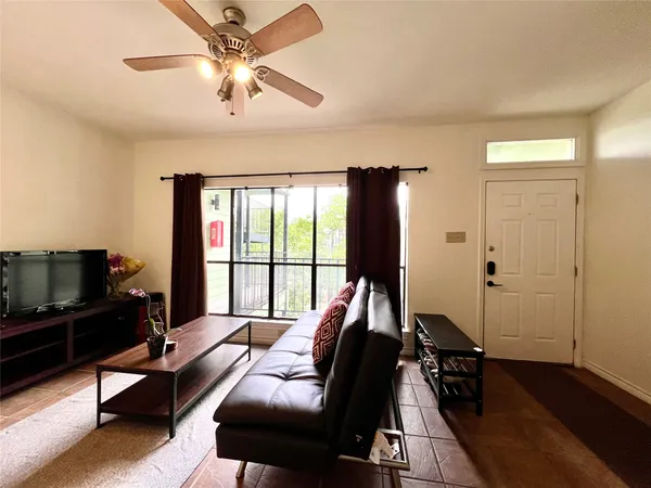 a bathroom with a toilet a sink and bathtub