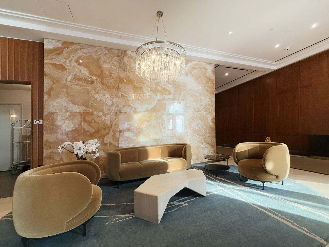 2150 Broadway, Unit PH2B Manhattan, NY 10023 - Photo 23 of 35 a living room with furniture and a chandelier