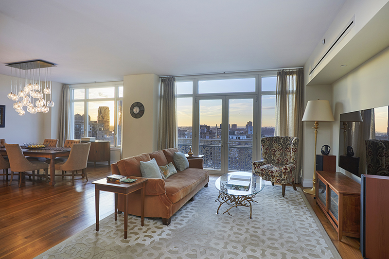 2150 Broadway, Unit PH2B Manhattan, NY 10023 - Photo 6 of 35 a living room with furniture and a floor to ceiling window