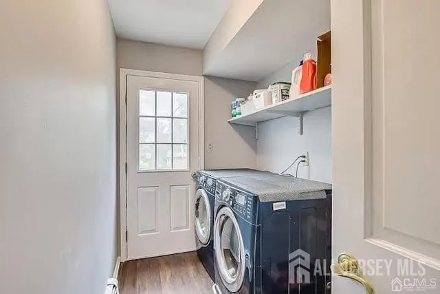 a utility room with dryer and washer
