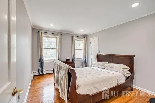 a bed room with a bed and a chair