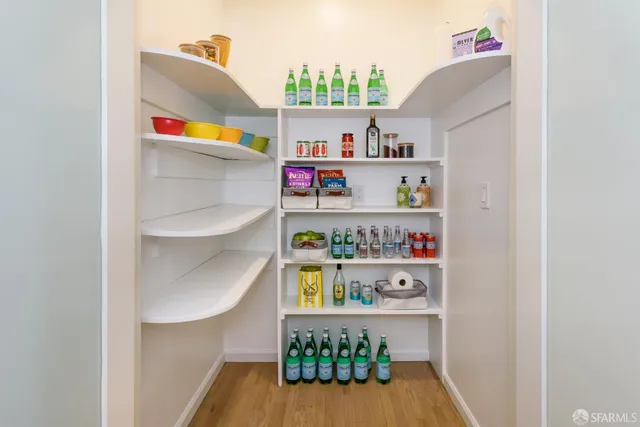 a livingroom with furniture and a table