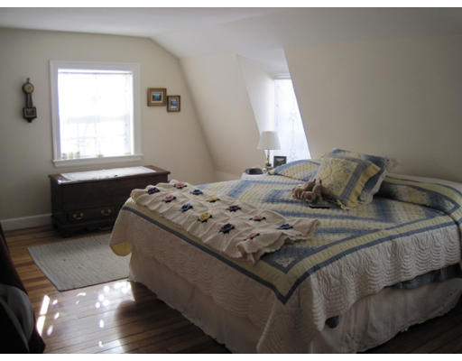 27 Crown Ridge Road Wellesley, MA 02482 - Photo 7 of 9 a bedroom with a bed and window
