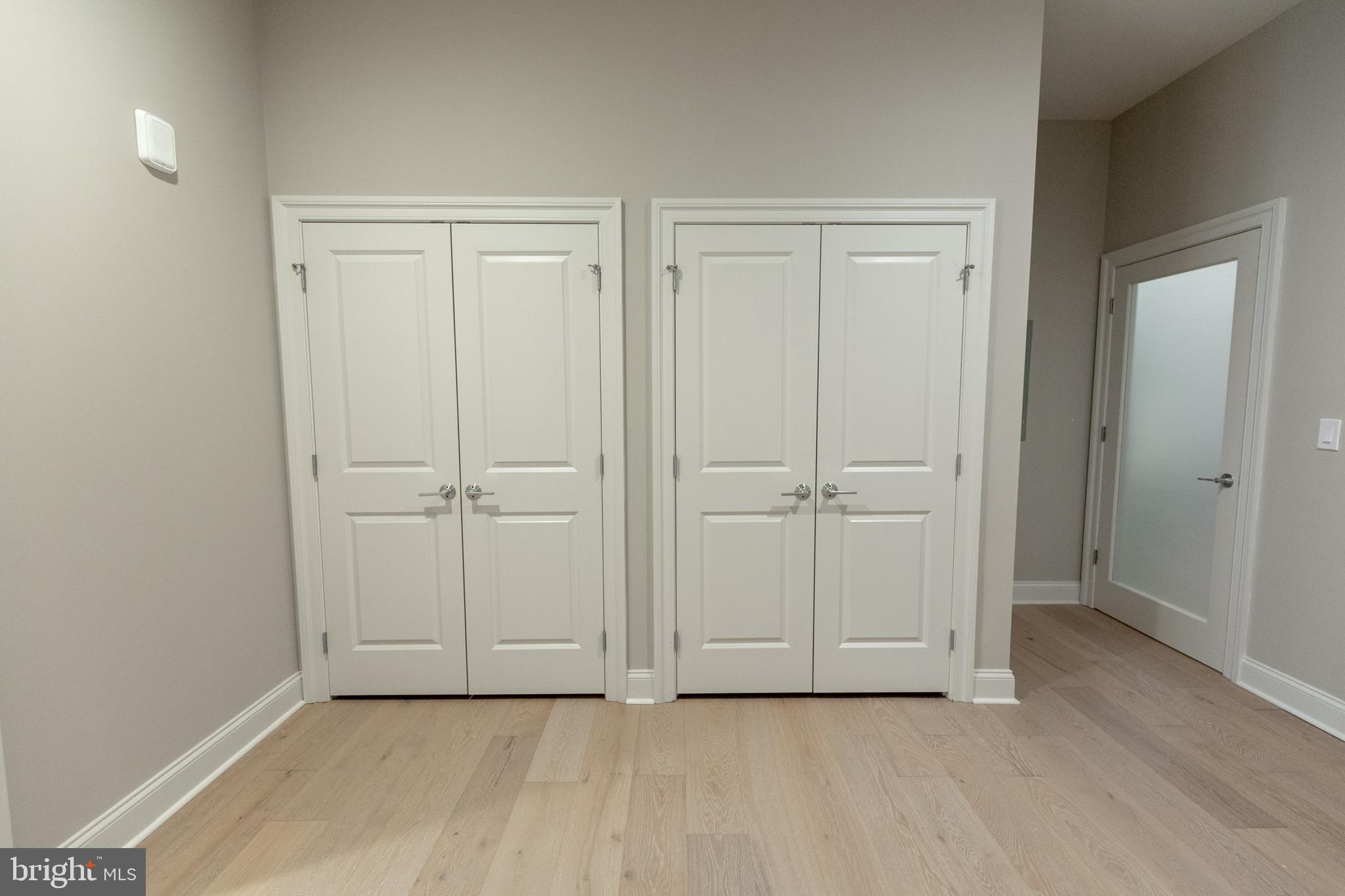 1411-1 Walnut Street, Unit 201 Philadelphia, PA 19102 - Photo 18 of 27 a view of an empty room and closet area