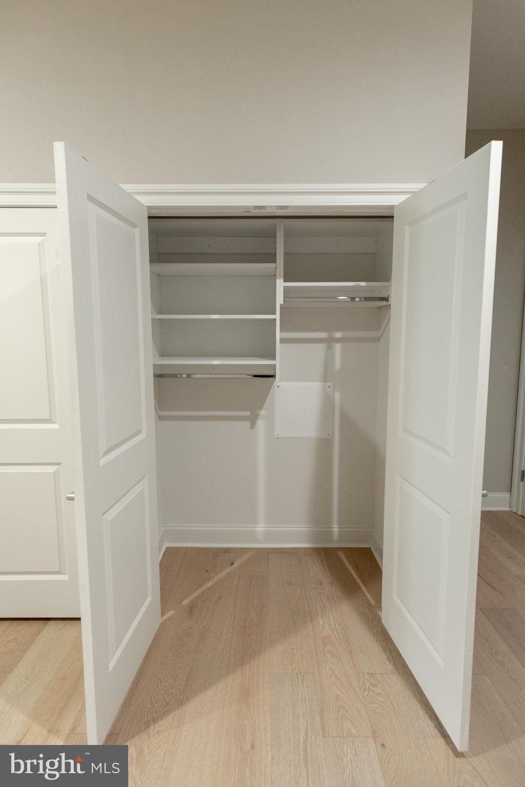 1411-1 Walnut Street, Unit 201 Philadelphia, PA 19102 - Photo 21 of 27 a view of walk in closet with empty racks