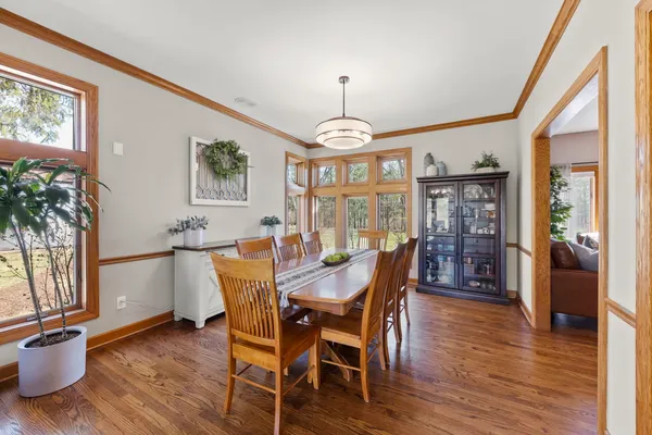 a kitchen with stainless steel appliances kitchen island granite countertop a sink and cabinets