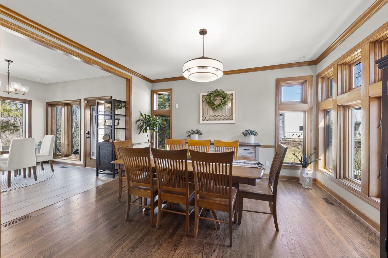 8877 Kennedy Road Yorkville, IL 60560 - Photo 12 of 86 a view of a dining room with furniture window and wooden floor
