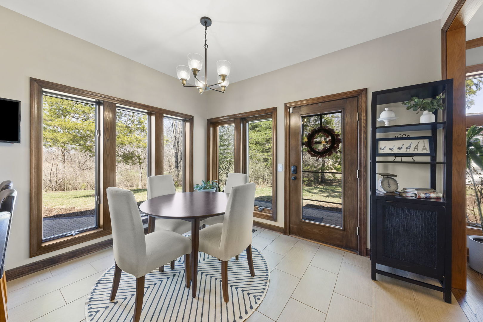 8877 Kennedy Road Yorkville, IL 60560 - Photo 15 of 86 a view of a dining room with furniture window and outside view