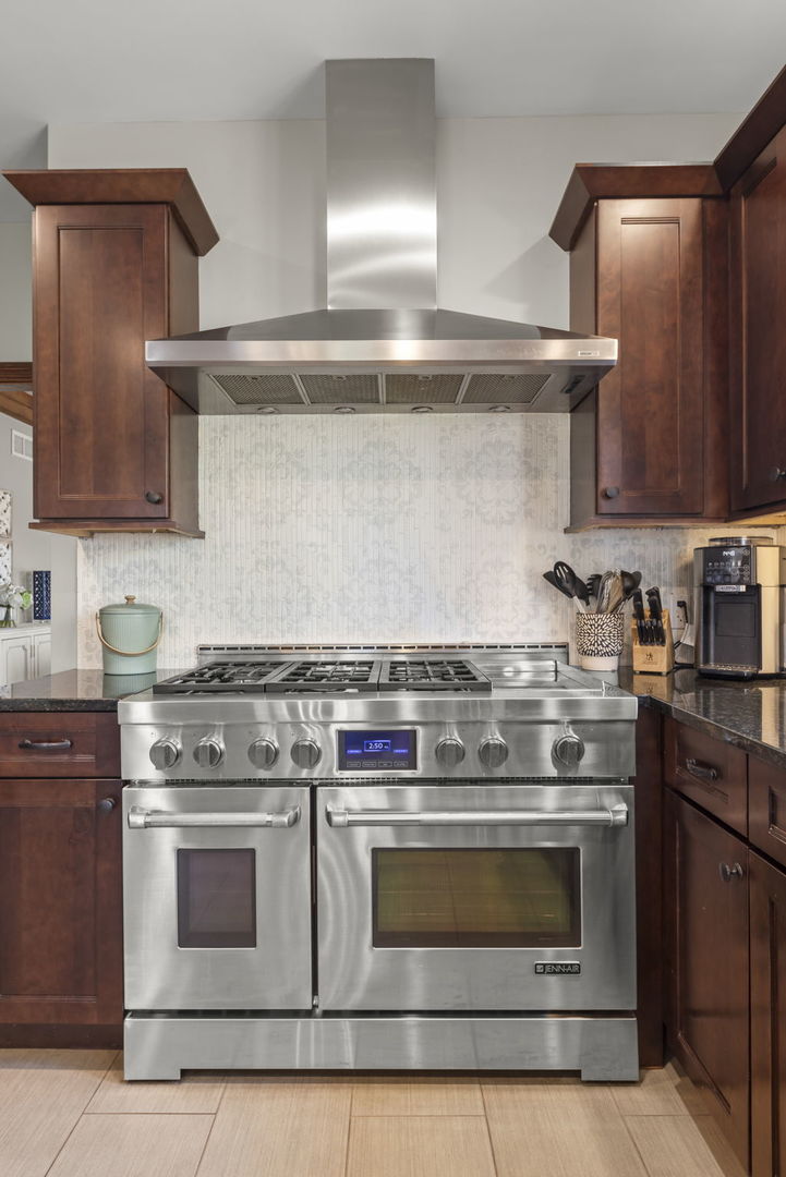 8877 Kennedy Road Yorkville, IL 60560 - Photo 21 of 86 a stove top oven sitting inside of a kitchen