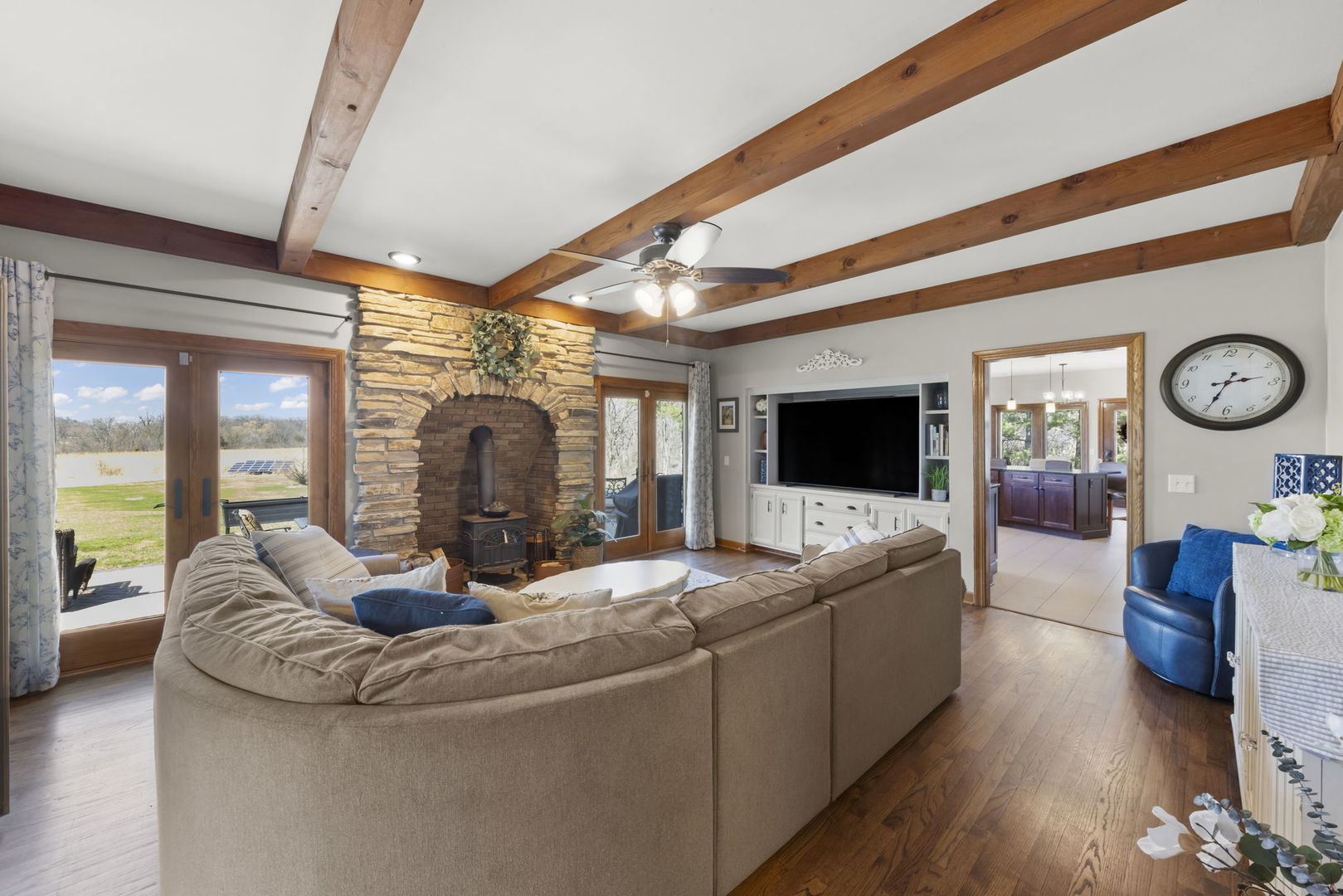 8877 Kennedy Road Yorkville, IL 60560 - Photo 22 of 86 a living room with furniture and a flat screen tv