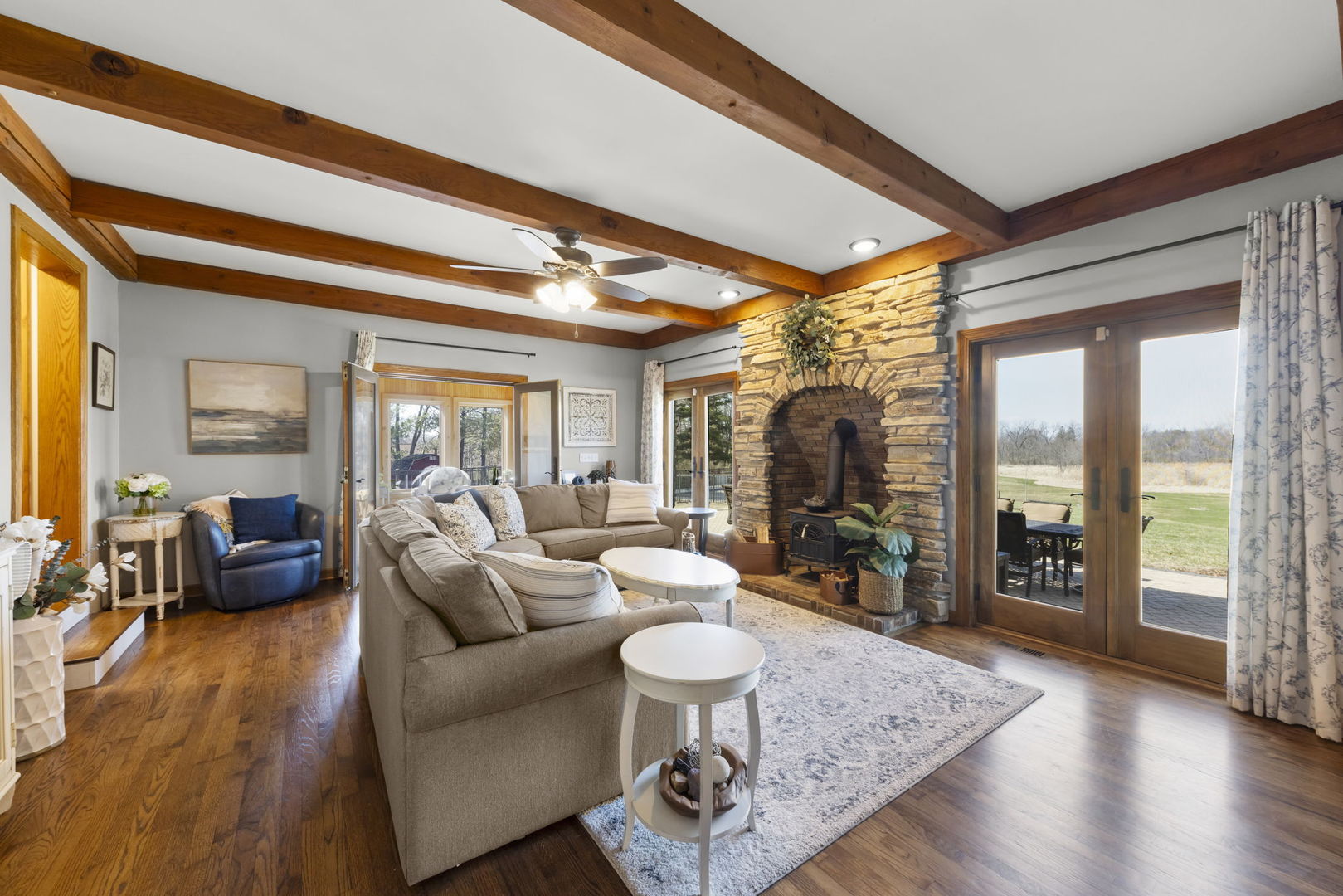 8877 Kennedy Road Yorkville, IL 60560 - Photo 23 of 86 a living room with furniture and wooden floor