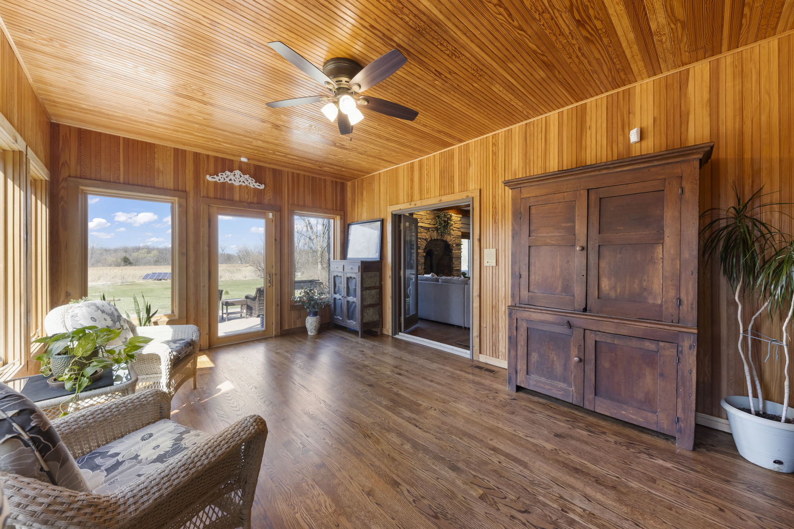 8877 Kennedy Road Yorkville, IL 60560 - Photo 26 of 86 a living room with furniture and wooden floor