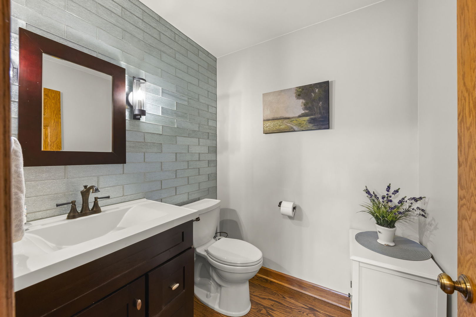 8877 Kennedy Road Yorkville, IL 60560 - Photo 28 of 86 a bathroom with a toilet a sink and mirror