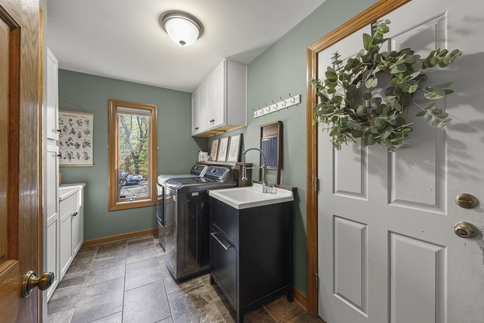 8877 Kennedy Road Yorkville, IL 60560 - Photo 29 of 86 a view of a kitchen with washer and dryer