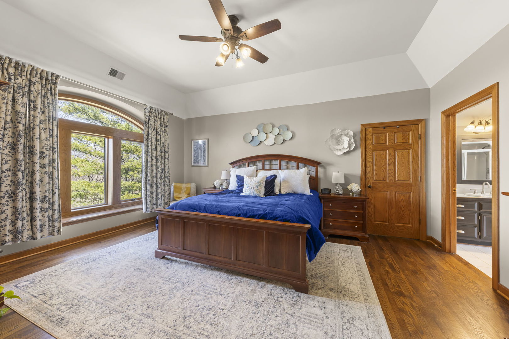 8877 Kennedy Road Yorkville, IL 60560 - Photo 31 of 86 a bedroom with a large bed and a window