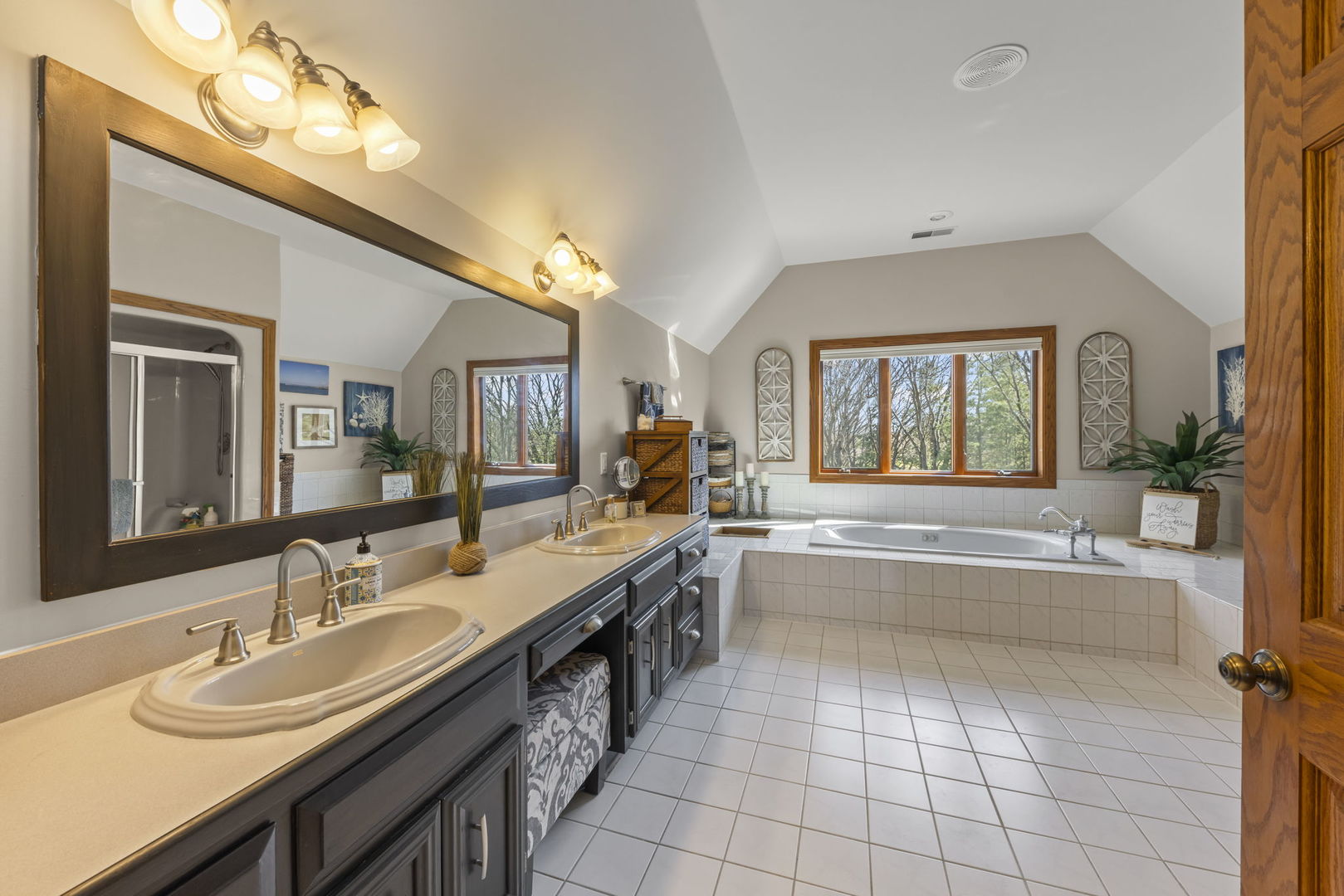 8877 Kennedy Road Yorkville, IL 60560 - Photo 35 of 86 a large bathroom with a large tub and sink