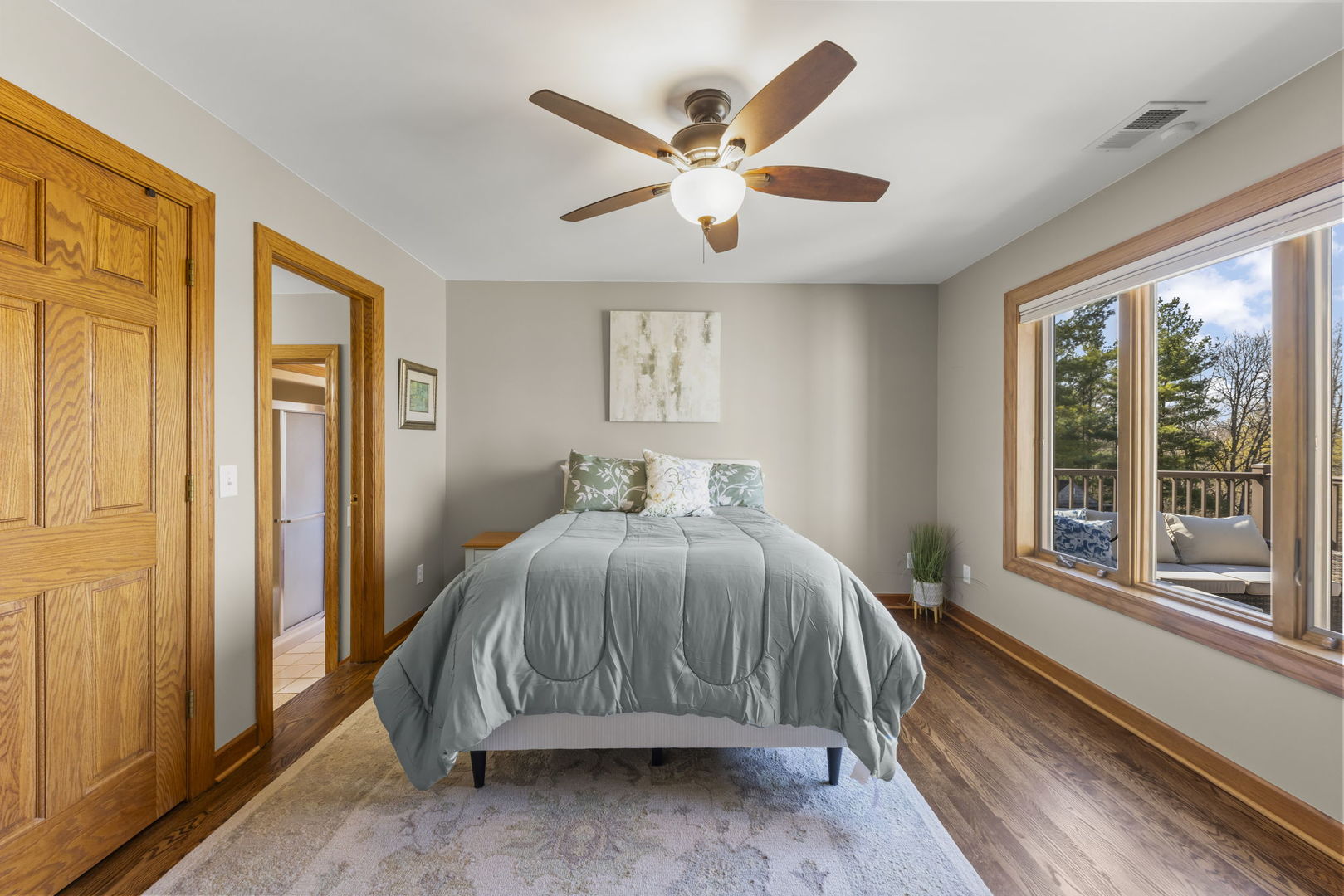 8877 Kennedy Road Yorkville, IL 60560 - Photo 37 of 86 a bedroom with a large bed and a large window