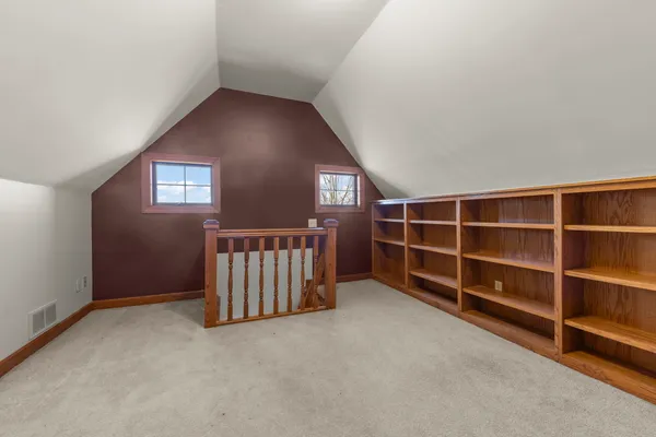 a picture of a cabinet with a white wall