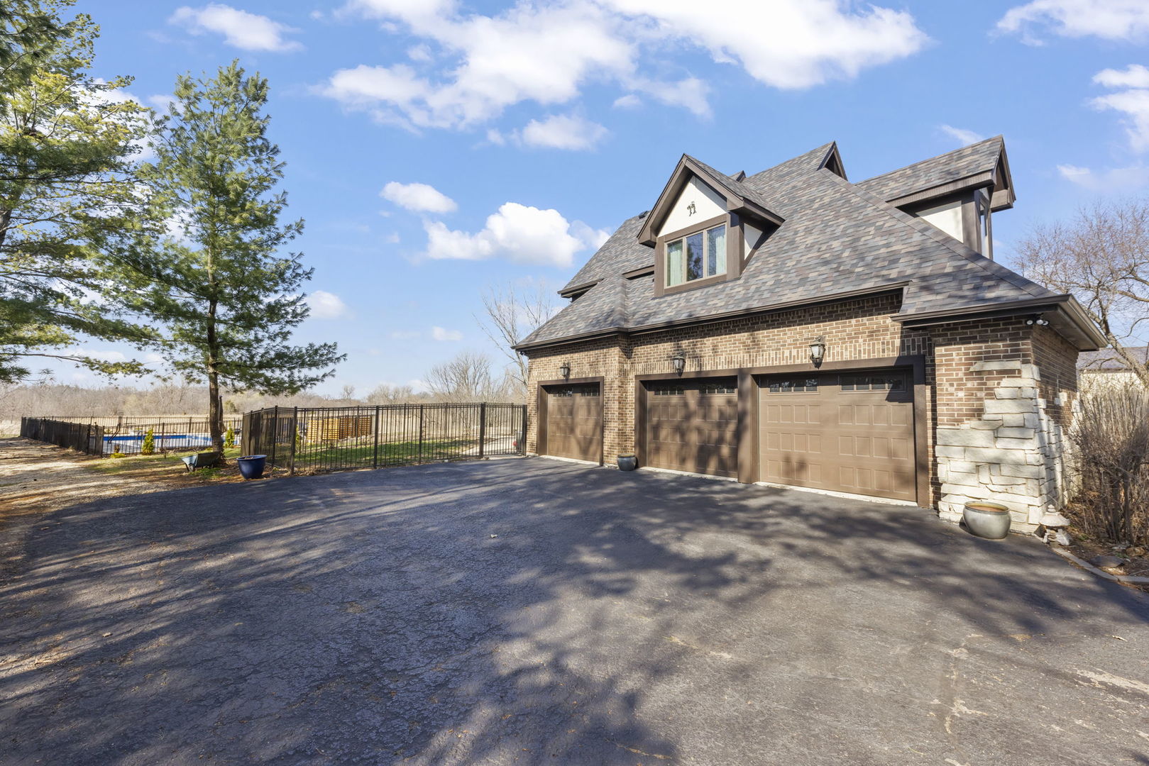 8877 Kennedy Road Yorkville, IL 60560 - Photo 57 of 86 a view of a house with a yard and pathway