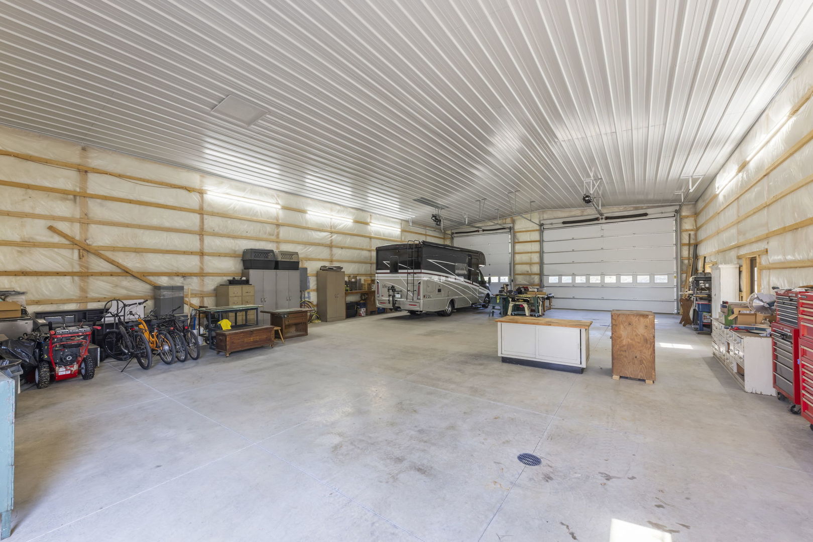 8877 Kennedy Road Yorkville, IL 60560 - Photo 60 of 86 a view of a garage with cars