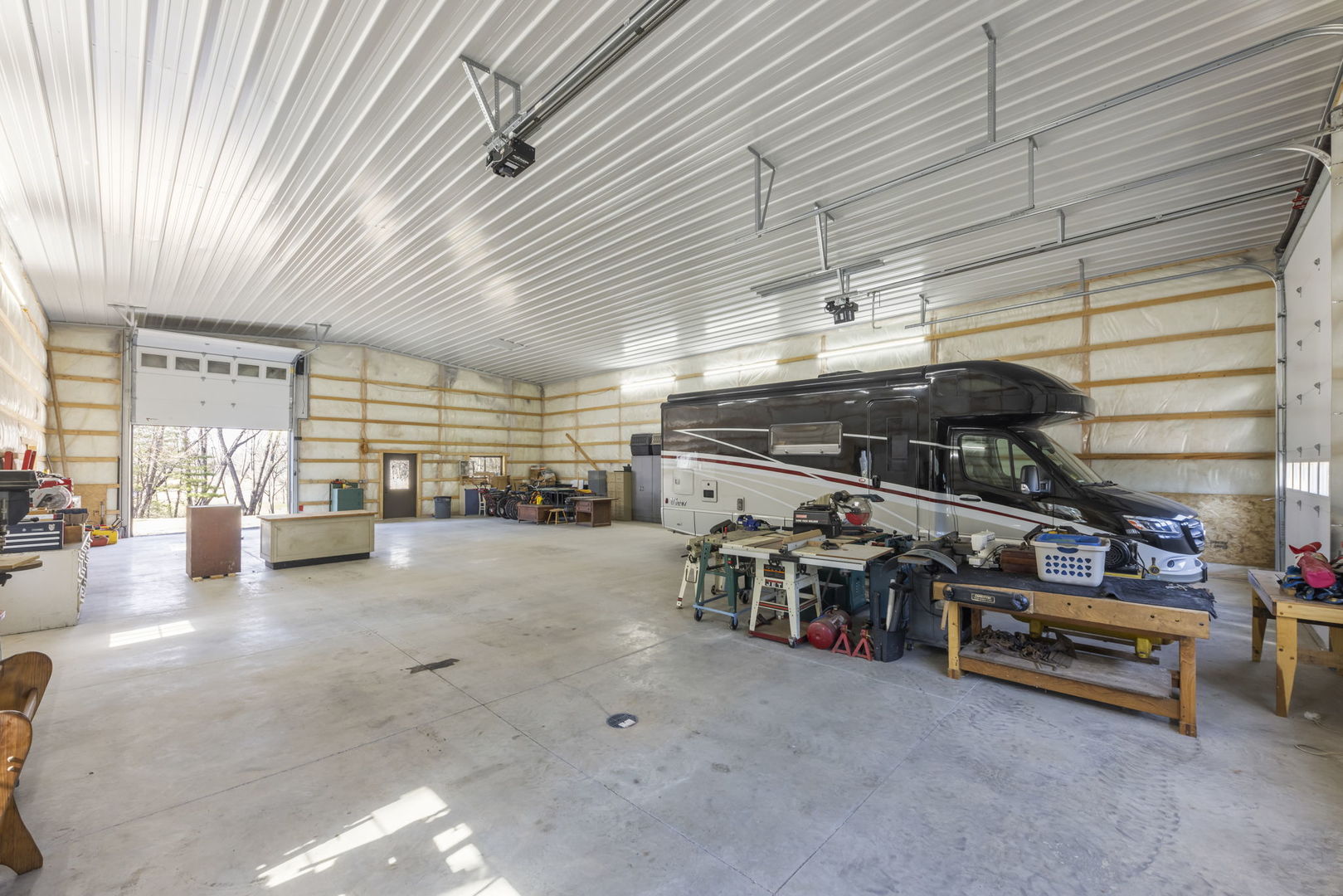 8877 Kennedy Road Yorkville, IL 60560 - Photo 61 of 86 a view of a garage room with racks
