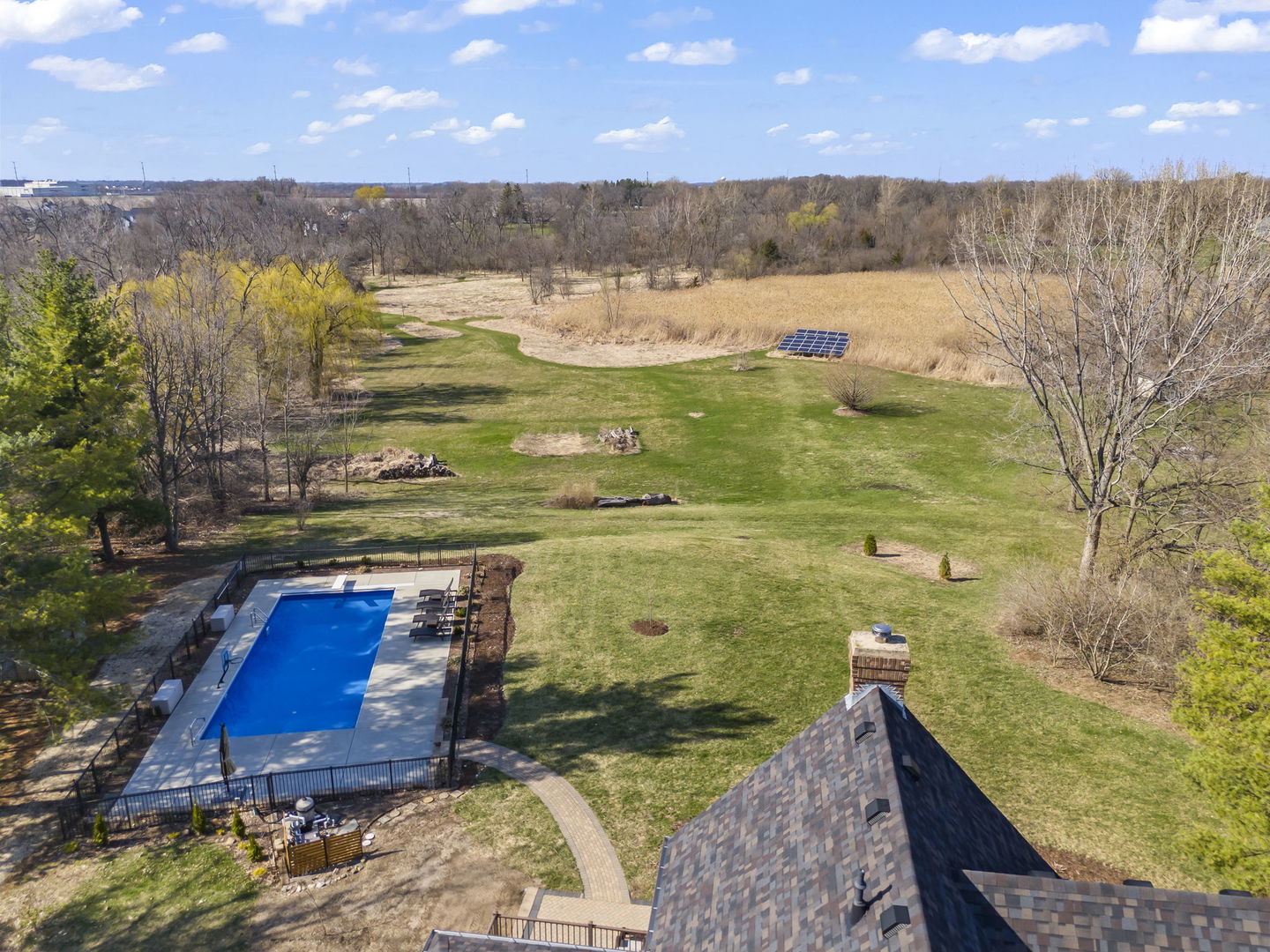 8877 Kennedy Road Yorkville, IL 60560 - Photo 64 of 86 a view of a pool with an outdoor space and seating area