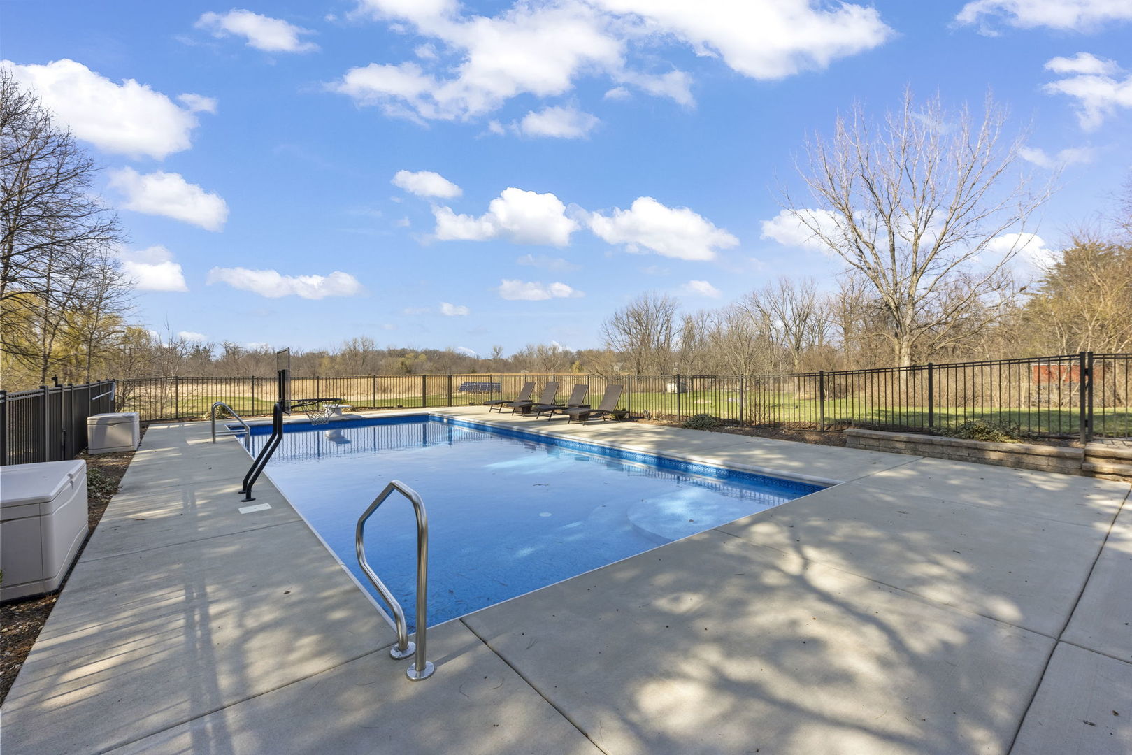 8877 Kennedy Road Yorkville, IL 60560 - Photo 65 of 86 a view of swimming pool with outdoor seating and city view