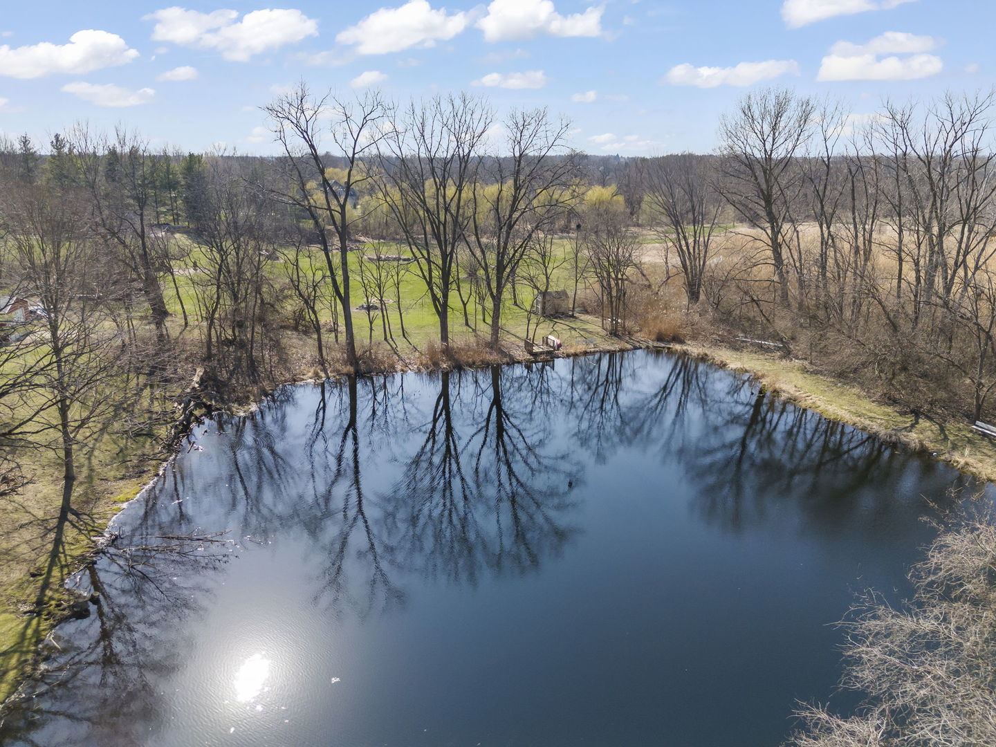 8877 Kennedy Road Yorkville, IL 60560 - Photo 70 of 86 a view of a lake with a mountain in the background