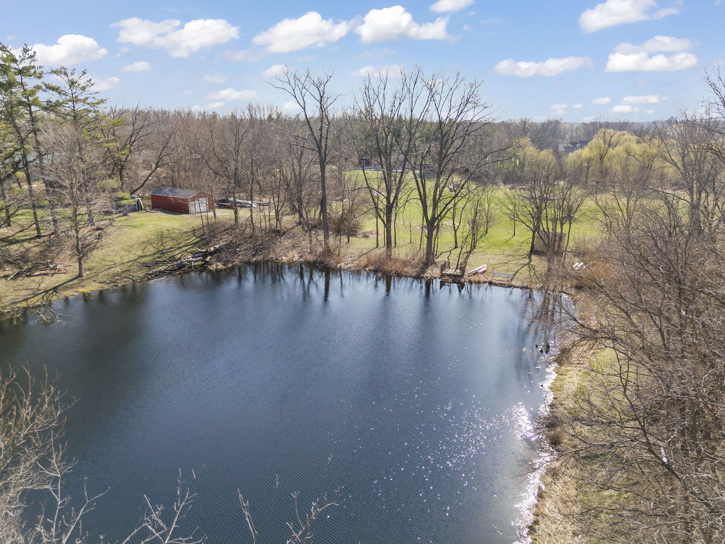 8877 Kennedy Road Yorkville, IL 60560 - Photo 72 of 86 a view of a lake with houses