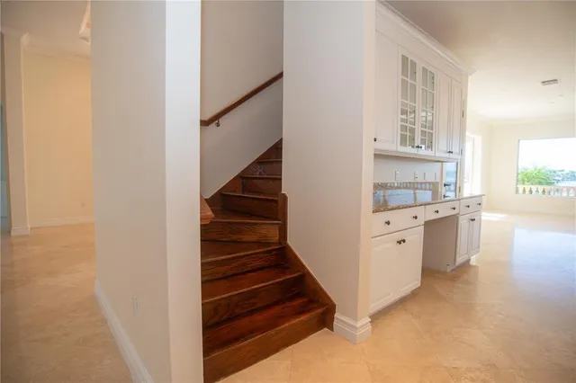 a view of entryway and kitchen